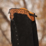 Black topgrain leather rough side out. Daisy design dark black/brown dye to edges.
